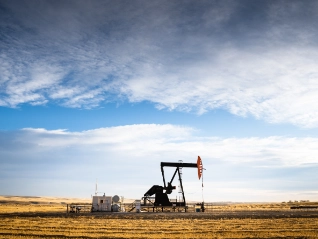Industrial oil pump on farm land