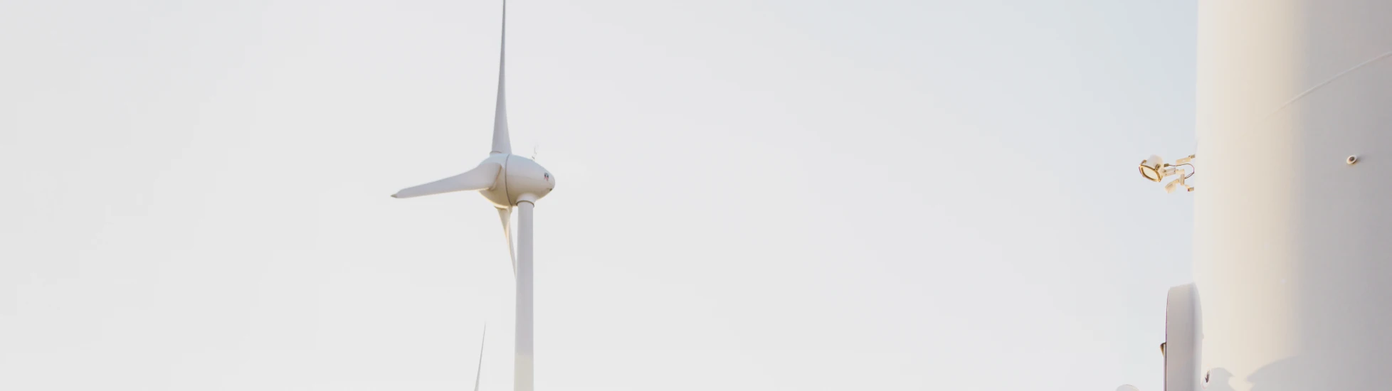Two wind turbine engineers working at height