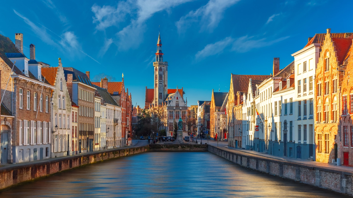 Scenic cityscape with canal Spiegelrei and Jan Van Eyck Square in the morning in Bruges, Belgium image