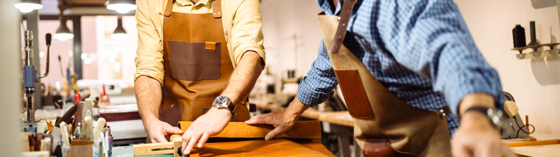 Two tanners working together